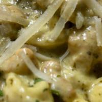Fusilli Pasta W/ Shrimp & Broccoli · Shrimp & Broccoli sautéed in a cream sauce over fusilli pasta