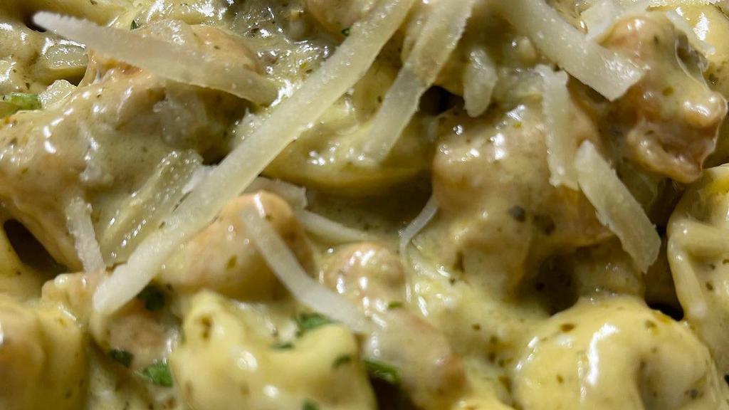 Fusilli Pasta W/ Shrimp & Broccoli · Shrimp & Broccoli sautéed in a cream sauce over fusilli pasta