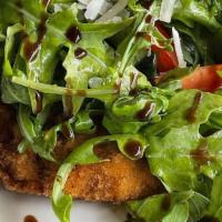 Veal Milanese · Pan Fried  Breaded  Veal Cutlet Topped With Arugula , Balsamic Vinegar Cherry Tomatoes  & Sh...