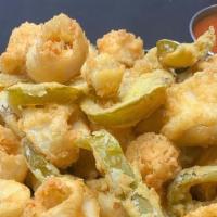 Waterfront Calamari · Fried calamari lightly battered with sauteed cherry peppers served with a side of marinara s...