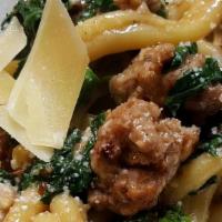 Fusilli Pasta With Sausage & Broccoli Rabe · Fusilli pasta with sausage & broccoli rabe sauteed in garlic oil