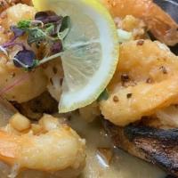 Shrimp Scampi (Appetizer) · Large shrimp with Garlic,Butter & White Wine. Served Over Crostini Bread.
