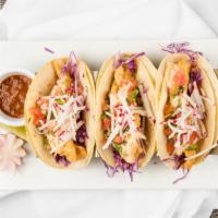 Crispy Fish Tacos · 3 crsipy fish tacos or 3 crispy shrimp tacos served with red cabbage slaw chipotle mayonnais...