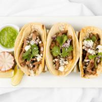 Carne Asada Tacos · Ribeye grill steak served with red onion cilantro and queso fresco.