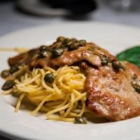 Veal Limone · Veal scaloppini with white wine, capers and lemon butter sauce.