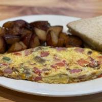 Build Your Omelet · All omelets are made with 3 eggs,  you can built the way you want.