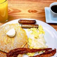 Two’S Company · 2 Buttermilk Pancakes or 2 French Toasts, 2 Eggs, 2 Bacon Strips & 2 Sausage Links