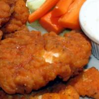 Buffalo Chicken Tenders · Crispy white chicken meat tenders and mixed with buffalo sauce.