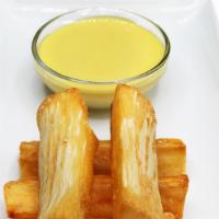 Yucca With Tartar Sauce · Fried Yucca with Peruvian Spiced Mayo Dipping Sauce