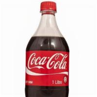 Coca Cola · 20 oz bottle