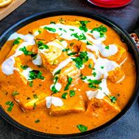 Paneer Butter Masala · Home made cheese cooked with bell peppers, onion & tomato/ rich creamy sauce