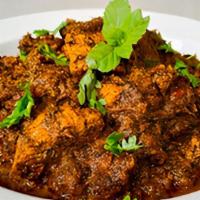 Gongura Goat/ Lamb · Goat/ lamb cooked with red sorrel leaves and special spices