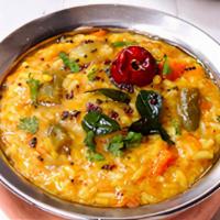 Sambar Rice (Served With Papad) · mashed rice with soup made of Vegetables & lentils.