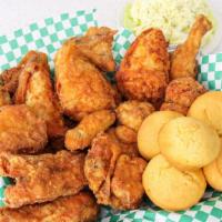 15 Piece  Order · 15 pieces served with a pint of coleslaw, five rolls or corn muffins, and honey.