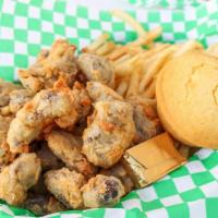 Gizzards · Boiled to tenderness, then dipped in buttermilk, lightly battered and fried to golden perfec...