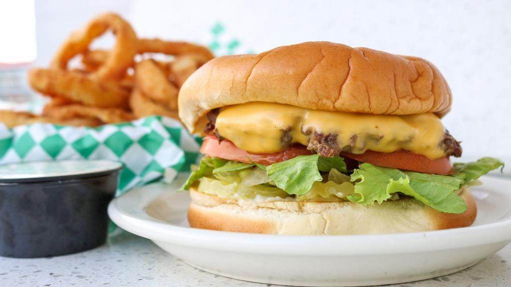 Jumbo Cheese · Customer favorite.  1/4 pound ground beef patty served with American cheese, lettuce, tomato, onion, pickle, mayonnaise, and mustard.