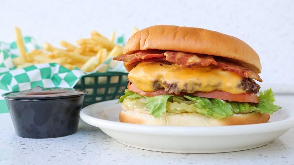 Jumbo Cheese With Bacon · 1/4 pound ground beef patty  served with  lettuce, tomato, onion, pickle, mustard and mayonnaise.