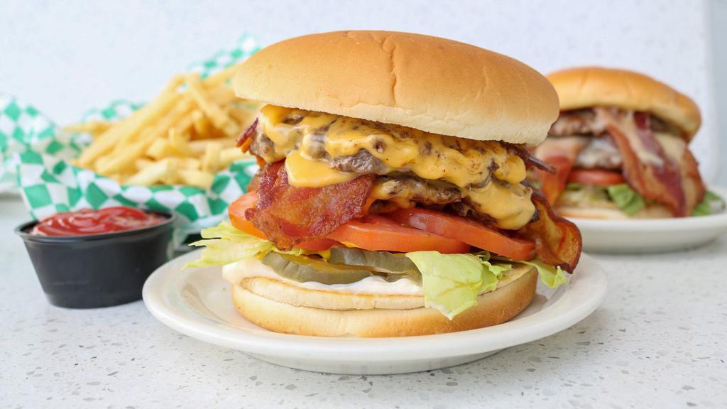 Double Jumbo Cheese With Bacon · Two 1/4 ground beef patties with double the bacon and double the cheese served with lettuce, tomato, onion, pickle, mustard and mayonnaise.