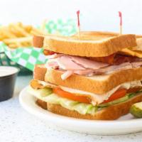 Club · Customer favorite. Turkey, ham, and bacon made with American cheese, lettuce, tomato, and ma...