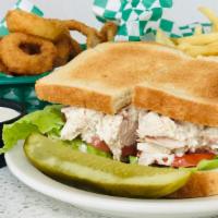 Chicken Salad Sandwich · Hand pulled, made with our famous pan-fried chicken. Served on toast with lettuce, tomato an...