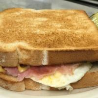 Ham & Egg · Ham served with a pickle wedge. Add Cheese for an additional charge.