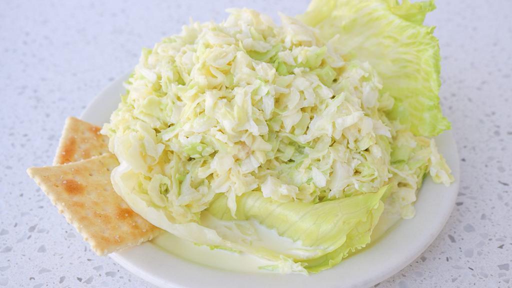 Coleslaw · Made fresh daily with our signature pineapple sauce.