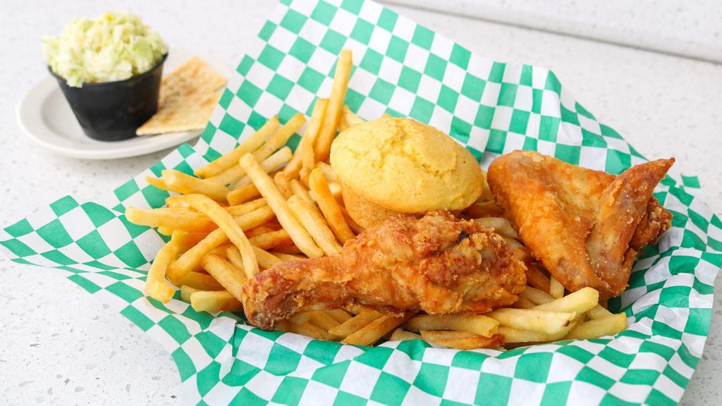 Junior 2 Piece Chicken (2 Legs) · Small chicken order 2 pieces.  Leg and a wing served with french fries and a roll.