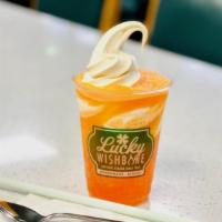 Creamsicle · Orange Fanta with a splash of vanilla and a swirl of our soft serve.