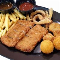 Fried Seafood Combo · Includes: crabcake, shrimp, scallops, and flounder, served with french fries and house salad.