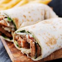 Greek Gyro · Delicious traditional greek gyro meat with lettuce, tomato and onions.