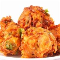 Pakora Vegan , Gluten Free · Mixed vegetable fritters. Served with tamarind and mint sauce.