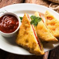 Bread Pakora Vegetarian , No Dairy , Contain Gluten  · Spiced potatoes stuffed in between 2 pcs of bread , Dipped in  gram flour batter and fried u...