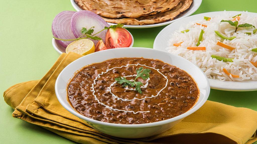 Daal Makhani Vegetarian , Gluten Free , Contain Dairy · Black lentils and kidney beans slow cooked with chef's special mild spices. Served with basmati rice. Gluten free. Nut free. Contains dairy.