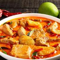 Coconut Fish Curry Halal , Gluten Free , Contains Dairy · Tender pieces of tilapia fish in coconut curry sauce. Served with basmati rice. Gluten free....