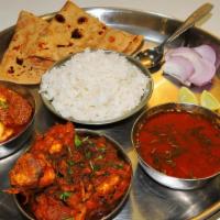 Chicken & Meat Combo Platter · Choice of 1 chicken entree and 1 meat entree. Served with basmati rice and 2 made-to-order t...