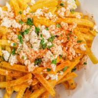 Greek Fries · Seasoned French fried topped with cheese, olive oil, Greek herbs and spices.