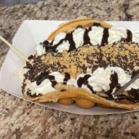 Bubble Waffle Sundae · Homemade Bubble Waffle, 3 Scoops of Ice Cream, 3 Toppings, topped with Whip Cream and Sprink...
