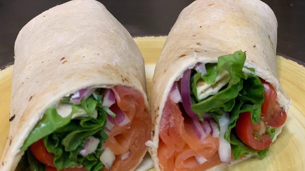 Veggie Wrap · Spinach, tomato, roasted red peppers, cucumbers, red onion, veggie cream cheese on a whole wheat wrap