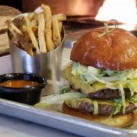 Royale With Cheese · Two beef patties, American cheese, lettuce, pickles, onions, special sauce, butter toasted p...