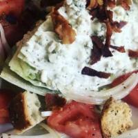 The Wedge Salad · Iceberg, blue cheese dressing, heirloom tomatoes, shaved, red onions, hard boiled egg, house...