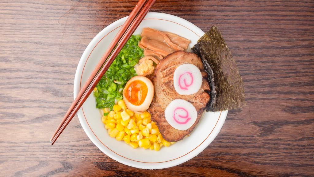Tonkotsu Ramen · Chashu, braised egg, bamboo shoot, sauteed bean sprout, grated garlic, sweet corn, Naruto fish cake, scallion and dried seaweed.