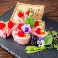 Sweetheart Roll · Tuna, avocado, asparagus, crunch, spicy mayo and topped with tobiko, wrapped with pink soy p...