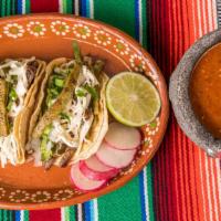 Tacos De La Tia · Three speciality tacos with grilled cactus, grilled chicken OR steak, jalapenos, onion, and ...