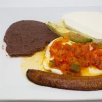 Huevos Rancheros · Sunny side up egg with salsa.