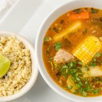 Sopa De Res · Beef soup, rice and tortillas.