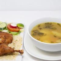 Sopa De Gallina · Hen soup, rice salad and tortillas.