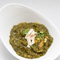 Chicken Saag · Spicy. Boneless chicken cooked with spinach and freshly ground spices.