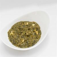 Palak Paneer · Fresh spinach cooked with cream and homemade cheese.