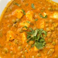 Mutter Paneer · Spicy. Fresh green peas cooked with homemade cheese chunks, herbs and light spices.