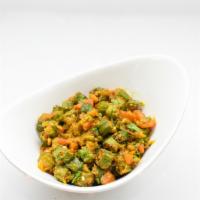 Bhindi Masala · Spicy. Fresh okra cooked with onions, tomatoes and Indian spices.
